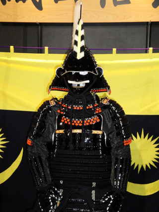 Illustration for article titled Booth Check: The Warlord Armor of TGS
